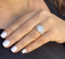 Load image into Gallery viewer, Round Cut Simulated Diamonds Engagement Ring And Band Three Stone Style Halo Bezel Set 14K Solid White Gold Wedding Bridal Set 2.75ctw