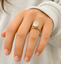 Load image into Gallery viewer, Oval Cut Simulated Diamonds And Round Cut Sides Engagement Ring And Matching Band Solitaire Wedding Set 5.30ctw Set In 14K Solid Yellow Gold