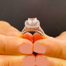 Load image into Gallery viewer, 14K Solid White And Rose Gold Cushion Cut Simulated Diamond Engagement Ring And Band Bridal Set Wedding Set Halo Split Shank 2.50ctw