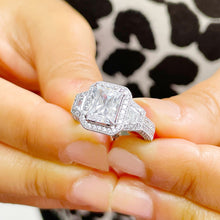 Load image into Gallery viewer, 14k Solid White Gold Radiant Cut Forever One Moissanite And Round And Trapezoids Cut Natural Diamonds Engagement Ring 4.00ctw