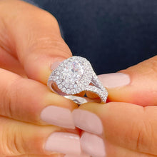 Load image into Gallery viewer, 14k Solid White Gold Oval and Round Cut Forever One Moissanite and Natural Diamond Engagement Ring Double Halo Split Shank Design 2.80ctw