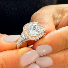 Load image into Gallery viewer, 14k White And Rose Gold Cushion Forever One Moissanite And Natural Diamond Engagement Ring Bezel Set 3.40ctw