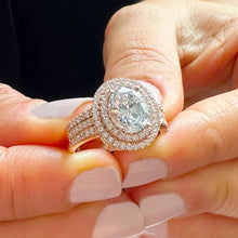 Load image into Gallery viewer, 14k Rose Gold Oval and Round Cut Forever One Moissanite and Natural Diamond Engagement Ring Double Halo Triple Shank Design 2.70ctw