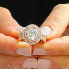 Load image into Gallery viewer, 14k Rose Gold Oval and Round Cut Forever One Moissanite and Natural Diamond Engagement Ring Double Halo Triple Shank Design 2.70ctw