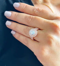 Load image into Gallery viewer, 14k Rose Gold Oval and Round Cut Forever One Moissanite and Natural Diamond Engagement Ring Double Halo Triple Shank Design 2.70ctw