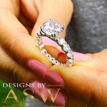 Load image into Gallery viewer, Four carat women's round cut forever one moissanite and diamond engagement ring eternity style bridal wedding set in solid 14k white gold