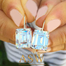 Load image into Gallery viewer, Huge and stunning 14k white gold emerald cut Forever One moissanite engagement, wedding, anniversary, bridal, earrings french post 7.0ctw
