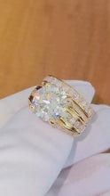 Load and play video in Gallery viewer, Round Shape Moissanites Engagement Ring Hidden Halo Design Wedding Ring And Matching Band 14K Solid Heavy Yellow Gold Bridal Ring 7.50ctw
