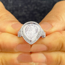 Load image into Gallery viewer, 14k Solid White Gold Pear Cut Moissanite and Natural Round Cut Diamond Engagement Ring Halo, Bezel Set 4.25ctw
