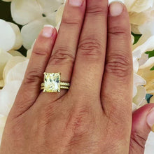 Load and play video in Gallery viewer, 14K Solid Yellow Gold Fancy Yellow Radiant And Round Cut Simulated Diamonds Engagement Ring And Band Halo Wedding Bridal Set 5.50ctw
